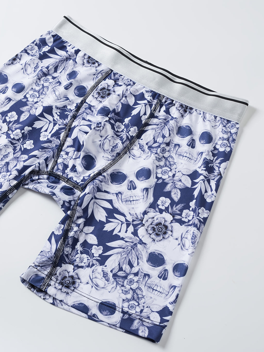 Caleçons à imprimé crâne floral pour hommes, en tissu tricoté polyester à haute extensibilité, design de poche en U pour la peau, anti-rayures et anti-humidité pour un usage quotidien et des activités en extérieur.